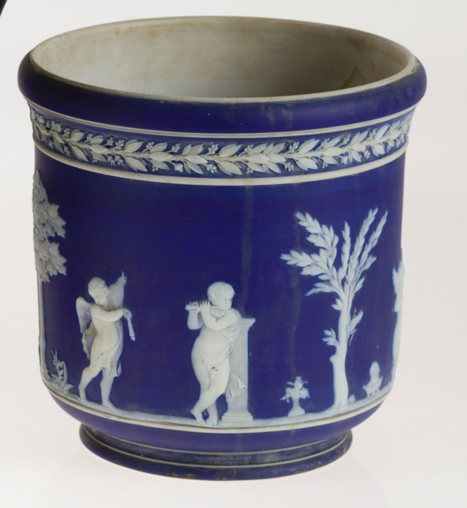 With decoration simulating blue and white cameo representing mythological scenes. It has a hair at (1 of 1)