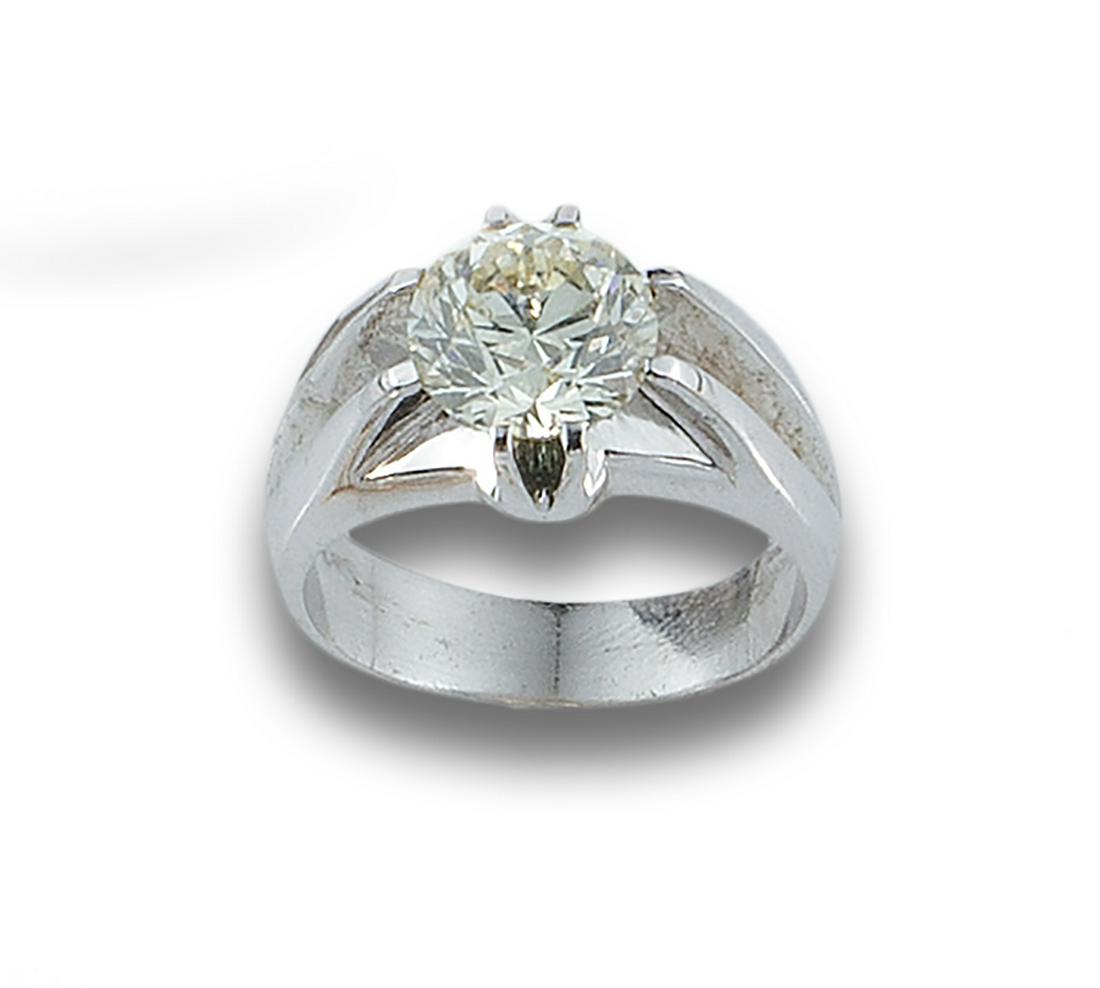 Wide beveled mount. Formed by a diamond, old cut, estimated weight 1.50 ct., chipped. Estimated (1 of 1)