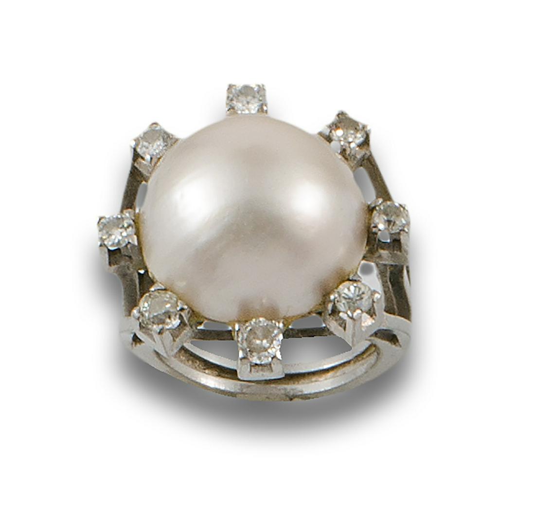 In diameter and bordered with diamonds, brilliant and antique cut, estimated total weight of 0.70 (1 of 1)