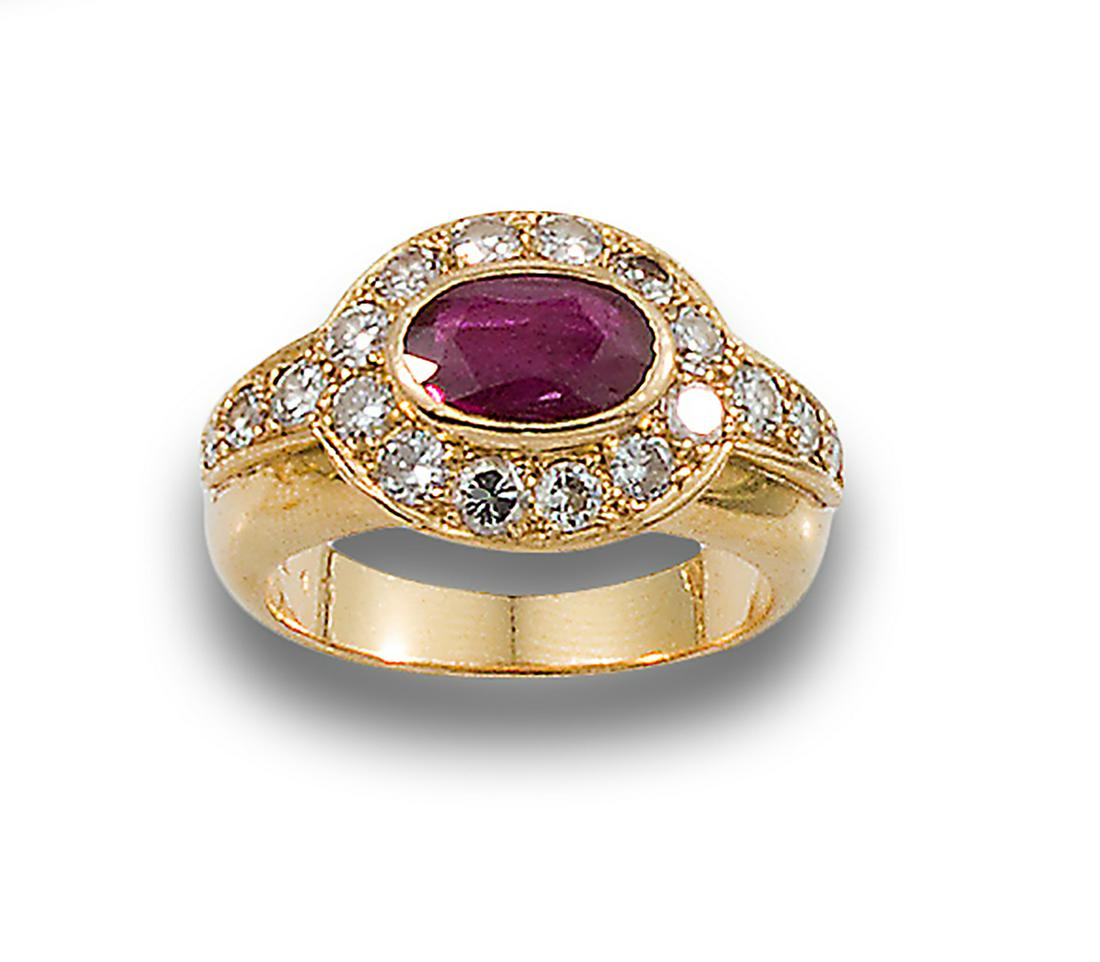 RING, 80S, DIAMONDS, RUBY AND YELLOW GOLD: 18 kt yellow gold ring, 1980s. formed by a central ruby, oval cut, estimated at 0.90 ct. set in chaton, bordered with diamonds, brilliant cut, set in grain.