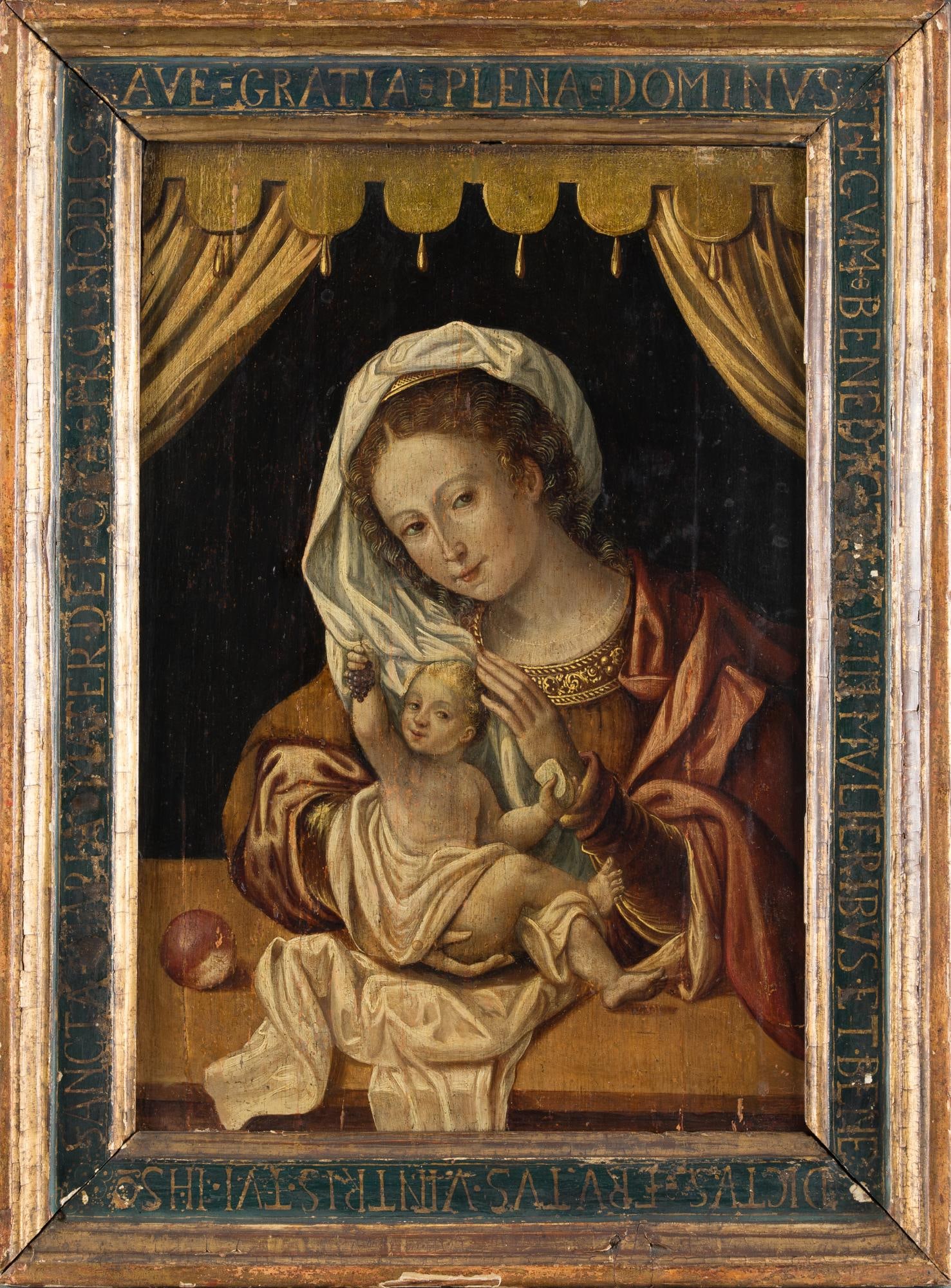 FOLLOWER OF JAN GOSSAERT CALLED "MABUSE" (16th century - 18th century) "Virgin with Child": Oil on panel. With a stylish frame presenting inscriptions that say the Hail Mary prayer. Measurements: 42 x 29 cm.