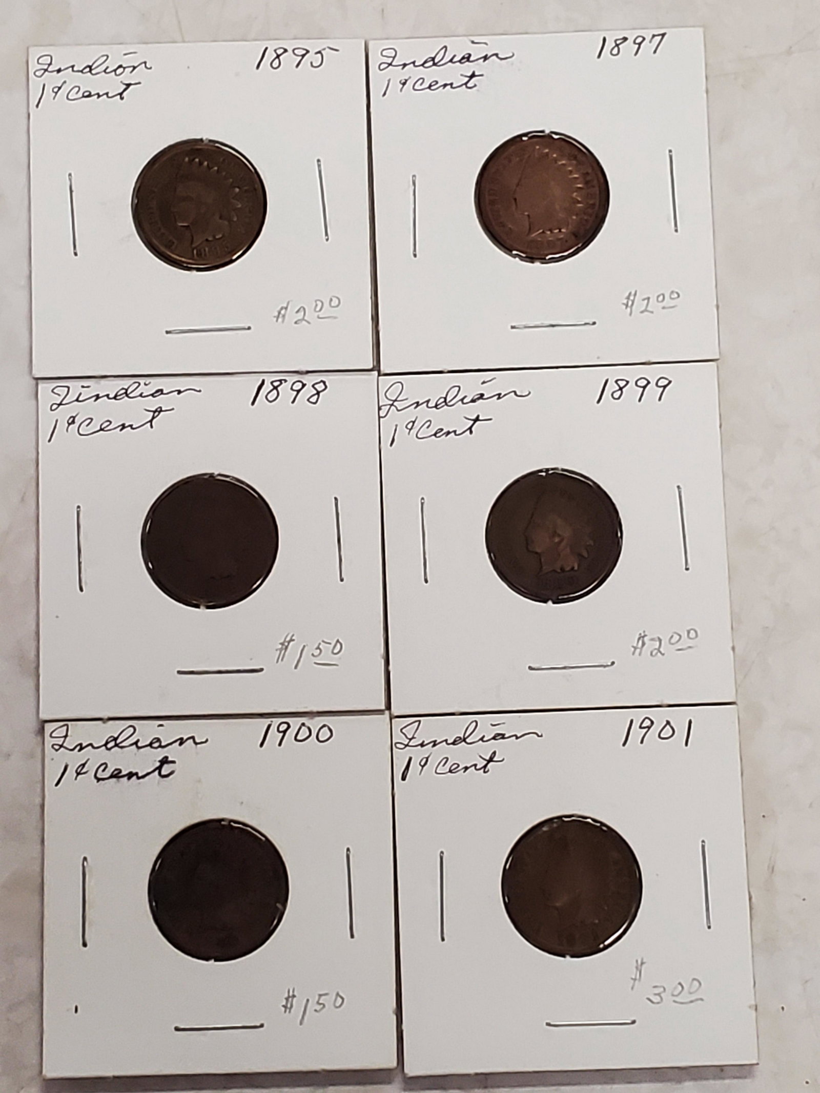 1895, 1897-1901 Indian Head Pennies SC8P5: Up for your bidding pleasure we have a lot of 6 indian head pennies, ranging in date from 1895, and 1897-1901. For our reference, these are located in book sc8, page 5. Conditions vary. I am not a gra