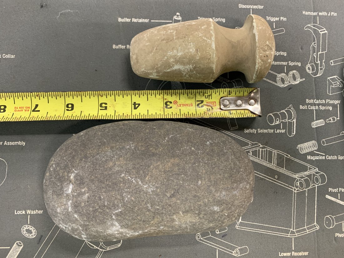 TWO ROCK FORMATIONS: SMALL HATCHET LOOKING THING AND ANOTHER POTATO SHAPED ROCK DUNNO! REMEMBER WE HAVE NO IDEA AS TO THE ORIGIN OF THESE ITEMS, STUDY PICTURES CLOSELY ASK QUESTIONS OR VIEW IN PERSON DAILY NOON TO FIVE. I