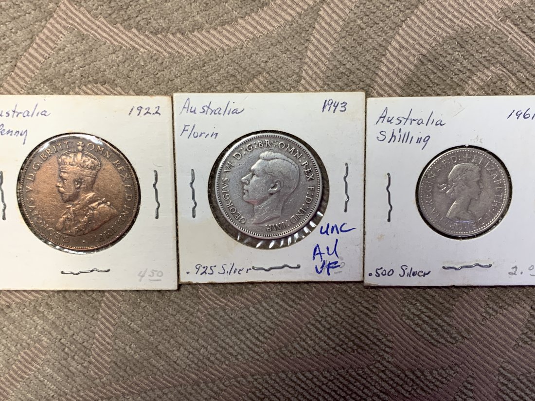 AUSTRALIA COINS SILVER OLD 1922 1943 1961: 1922 1 PENNY NICE CONDITION, 1943 FLORIN SILVER LOOKS GREAT! 1961 SHILLING SILVER! GRADES ON THE SLEEVES ARE FROM THE PREVIOUS COLLECTOR/OWNER. I MAKE NO CLAIM OR HAVE NO KNOWLEDGE OF COINS. MY OPINIO
