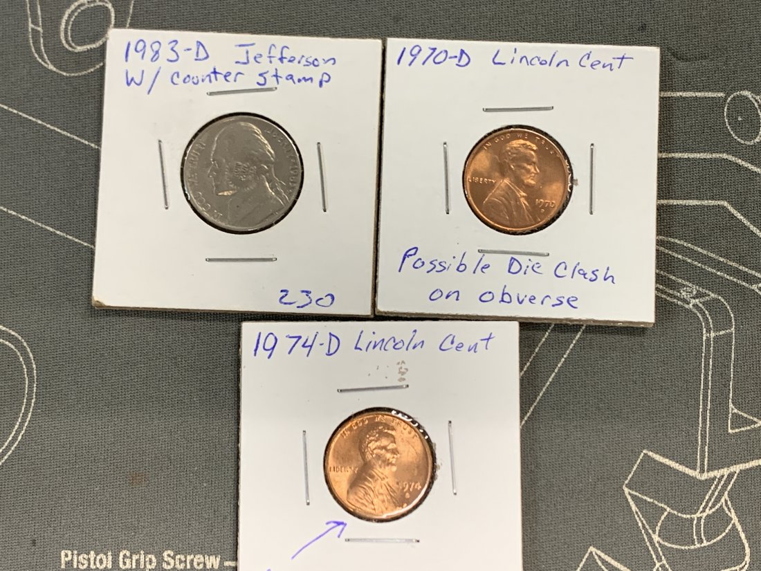 Counterstamped NICKEL DIE CLASH PENNY AND CUD PENNY: THESE ARE MARKINGS ON SLEEVES. I DONT KNOW IF THEY ARE WHAT THEY SAY THEY ARE! USE PICTURES FOR GUIDE! THE NICKEL STAMP SAYS RON PAUL I BELIEVE! GRADES ON THE SLEEVES ARE FROM THE PREVIOUS COLLECTOR/O