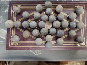 33 CLAY MARBLES: SOME ARE REALLY LUMPY, SOME ARE REALLY ROTUND LOL. SEE PICTURES. BOOK AND QUARTER NOT INCLUDEDGRADES ON THE SLEEVES ARE FROM THE PREVIOUS COLLECTOR/OWNER. I MAKE NO CLAIM OR HAVE NO KNOWLEDGE OF COINS