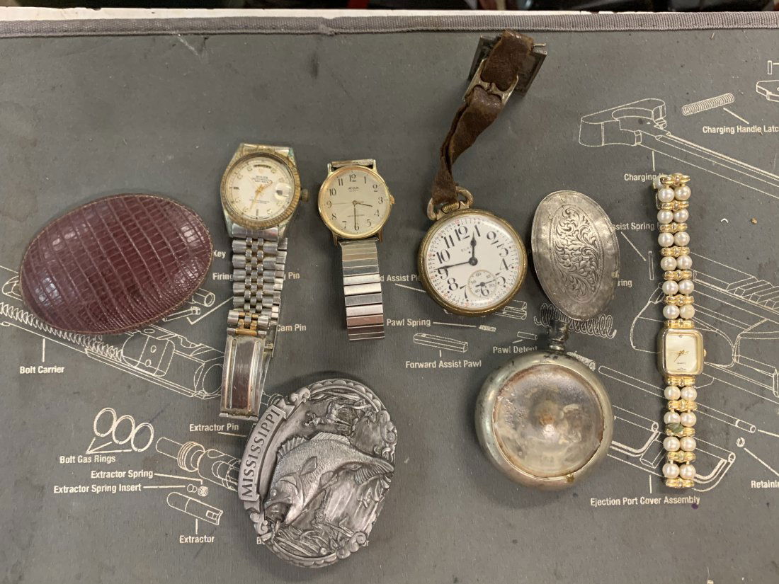 WATCHES BELT BUCKLES AND BOLO: WATCHES BELT BUCKLES UNTESTED USE PICTURES AND ASK QUESTIONS BEFORE YOU BID OR BUY .WE WILL COMBINE SHIPPING gold color pocket watch does not appear to work