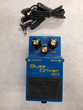 Boss blues driver bd-2 with daisy chain power cord: Boss blues driver bd-2 with daisy chain power cord. Power supply not included. Tested, works; pots need cleaning. There is just a little bit of static when I turn the knobs. Not really noticeable whil