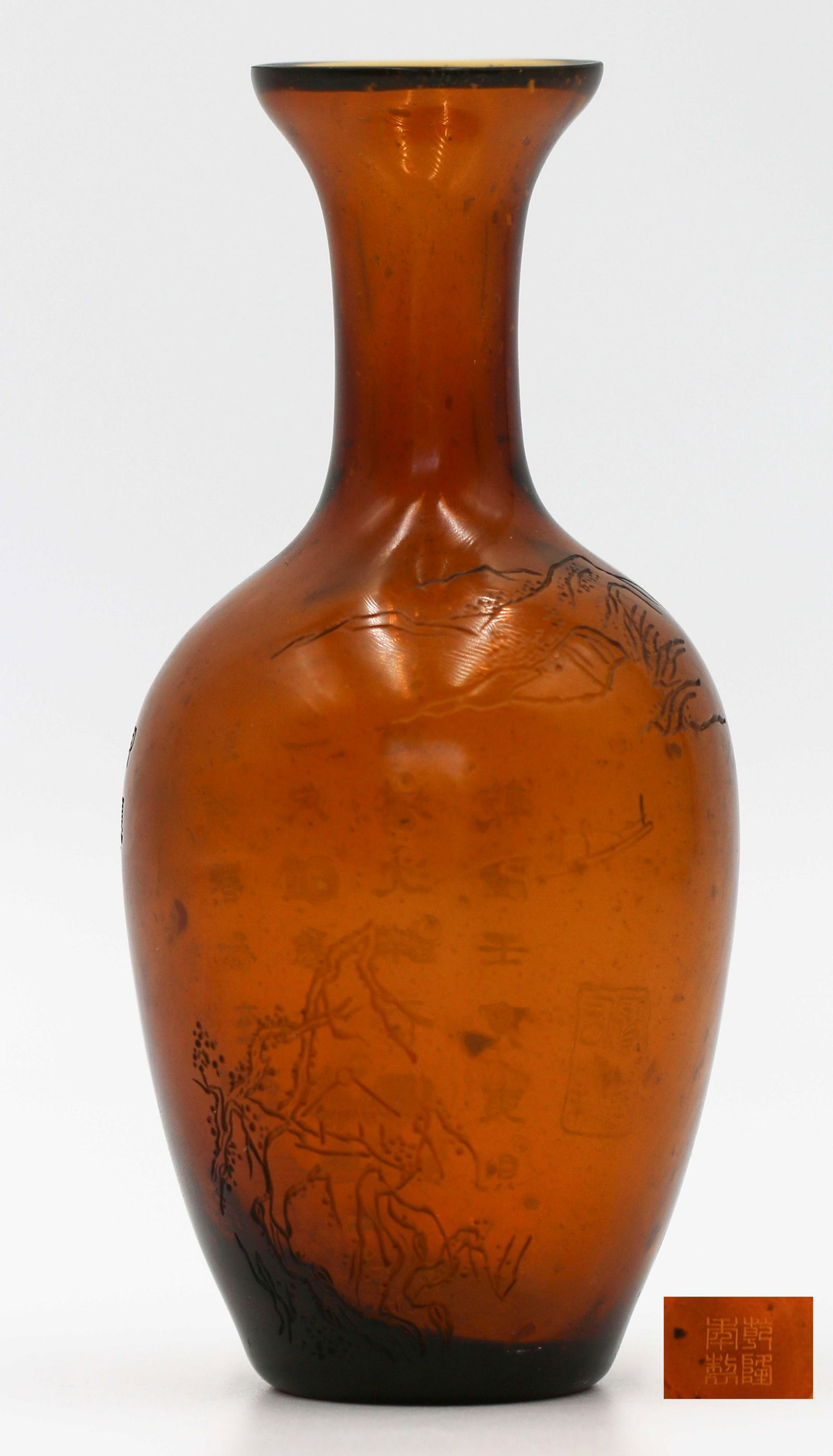 A CHINESE BROWN INSCRIBED GLASS VASE: Chinese Qing Dynasty Period, brown inscribed glass vase. Bottle round, long body, bell mouth, thin neck, abundant shoulder, flat bottom. The whole body is transparent brown color, this bottle is blown