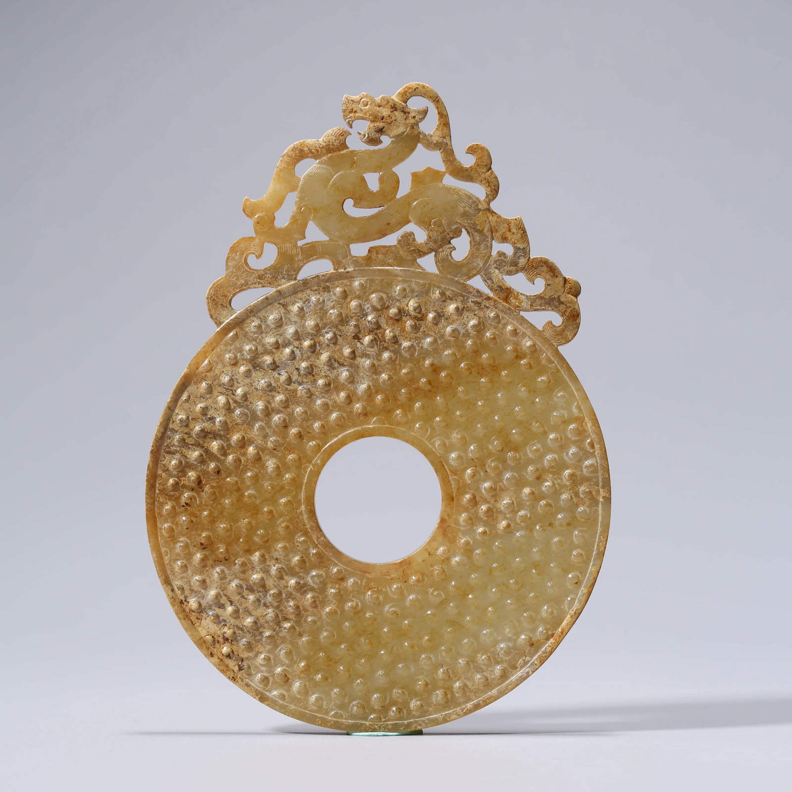 AN ARCHIASTIC JADE CARVED BI: Dimensions: Length: 13.5cm x Width: 9.8cm x Height: 0.5cm PROVENANCE: From the Private Collections Estate of Gerald A Hagan (1930-2019) of Georgia. Formerly from Dayton, Ohio, a Korean War Veteran, AS