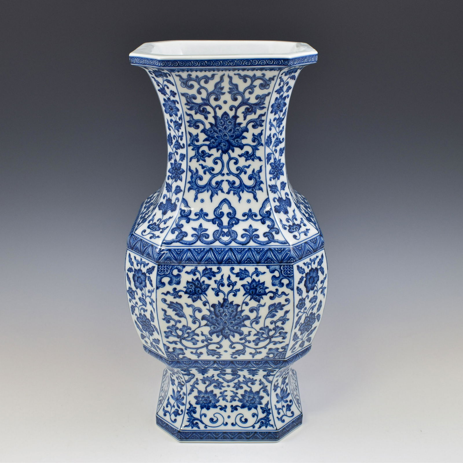 QIANLONG BLUE & WHITE WRAPPED FLORAL OCTAGONAL ZUN VASE (1 of 12)