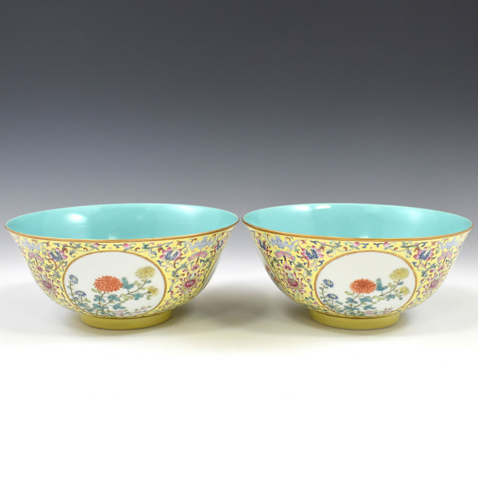 PAIR DAOGUANG FAMILLE JAUNE BOWL: Dimensions: 3-5/8" H x 8" Diam. (each) The Chinese porcelain is finely potted with rounded cavetto elevating steep sides leading to slightly flared rim, raised on footed ring base. The exterior delica