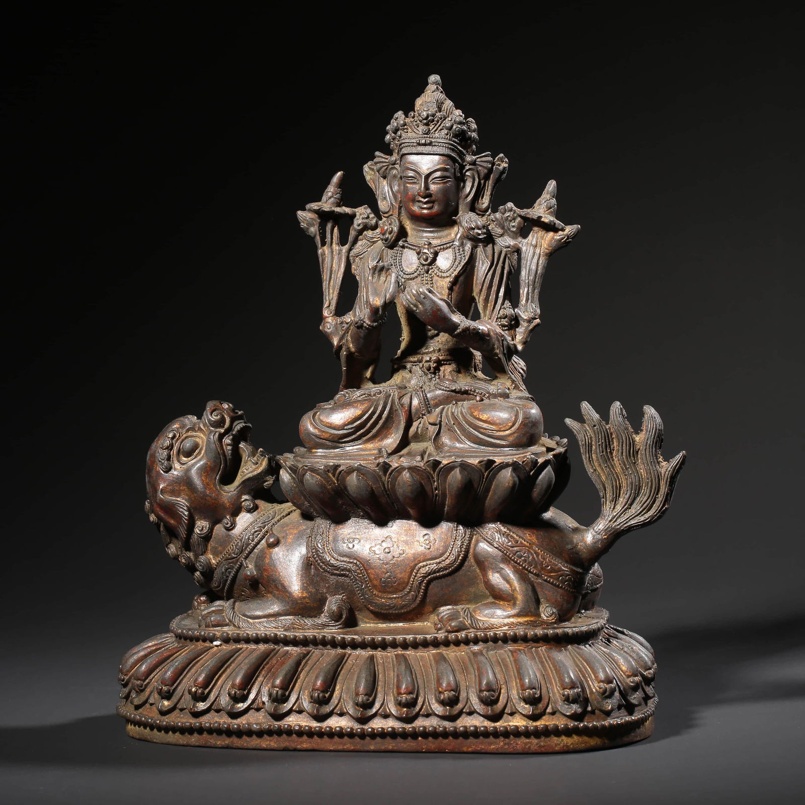 A GILT-BRONZE STATUE OF MANJUSHRI (1 of 5)