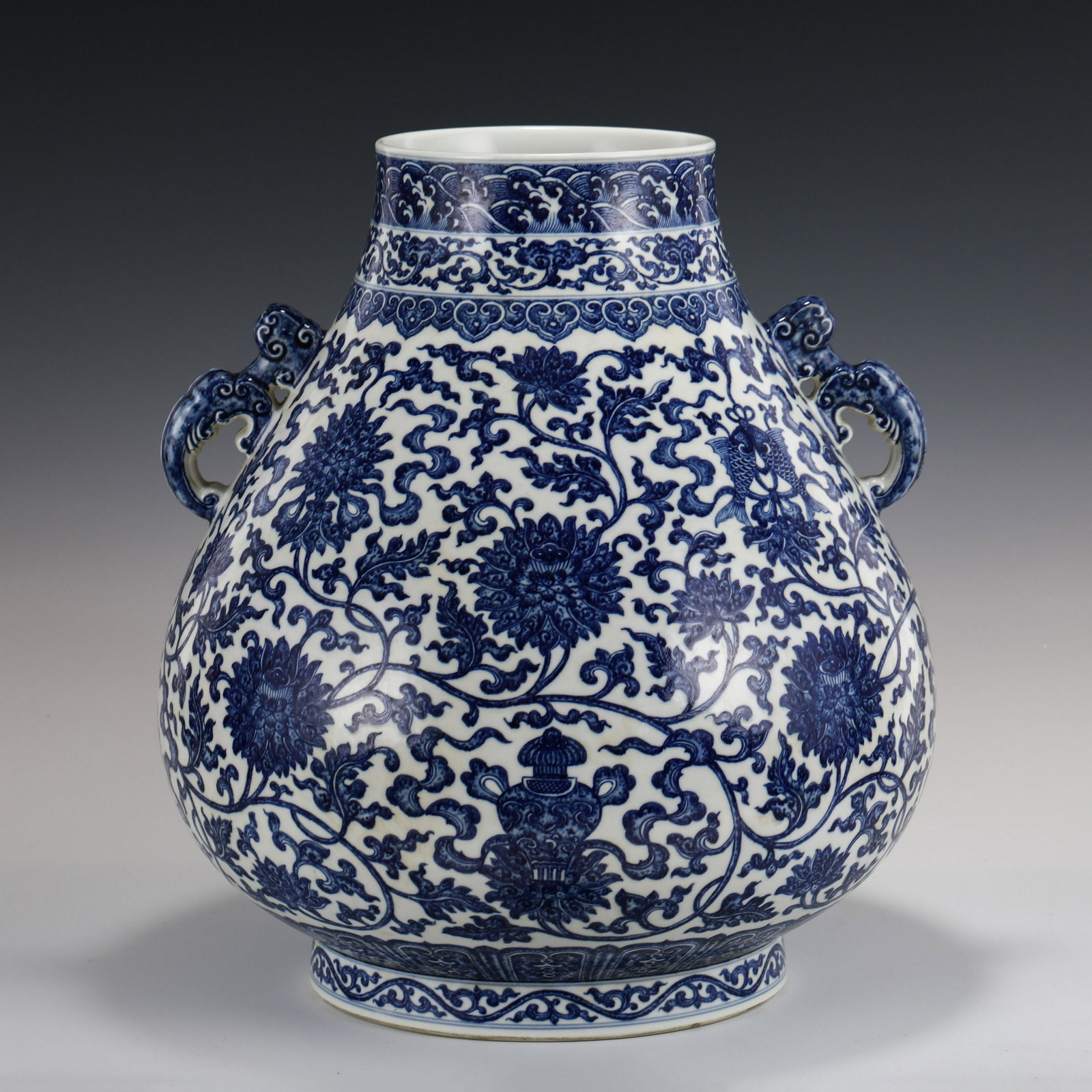 QING BLUE & WHITE AMPHORA FLORAL ZUN VASE: PROVENANCE: From the Collections of Franklin Wood (1924-2019) Cartersville, GA. Franklin was born in a small farmhouse near White GA in 1924. After spending his early childhood on the family farm the 