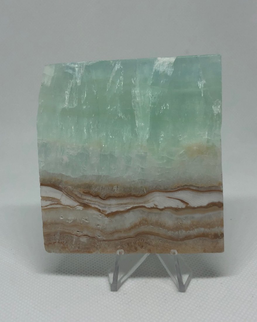 Blue "Caribbean" Calcite Slab: Blue "caribbean" calcite slab. Pakistan. Approx 2.75" x 2.75". AS ALWAYS WE OFFER IN-HOUSE SHIPPING VIA USPS FLAT RATE SHIPPING, NO EXTRAVAGANT SHIPPING FEES!