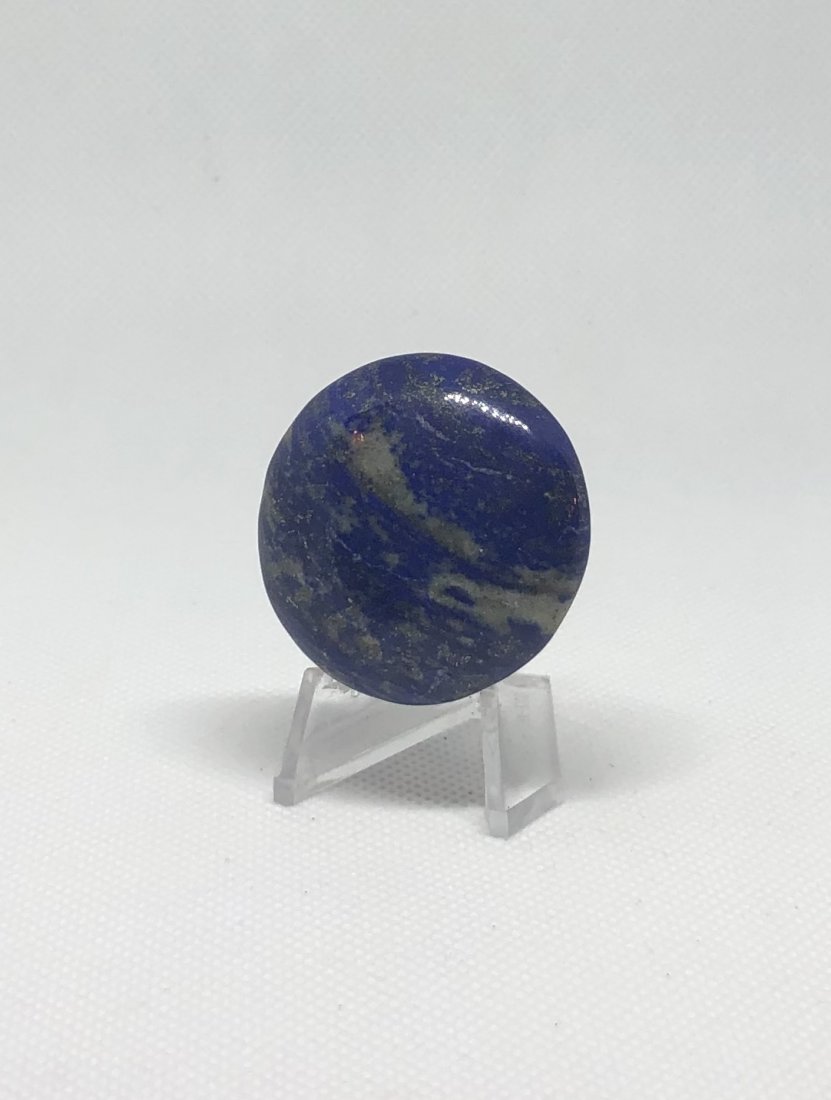 Lapis Lazuli Worry Stone: Small lapis lazuli worry stone. Approx 1.5" diameter. AS ALWAYS WE OFFER IN-HOUSE SHIPPING VIA USPS FLAT RATE SHIPPING, NO EXTRAVAGANT SHIPPING FEES!
