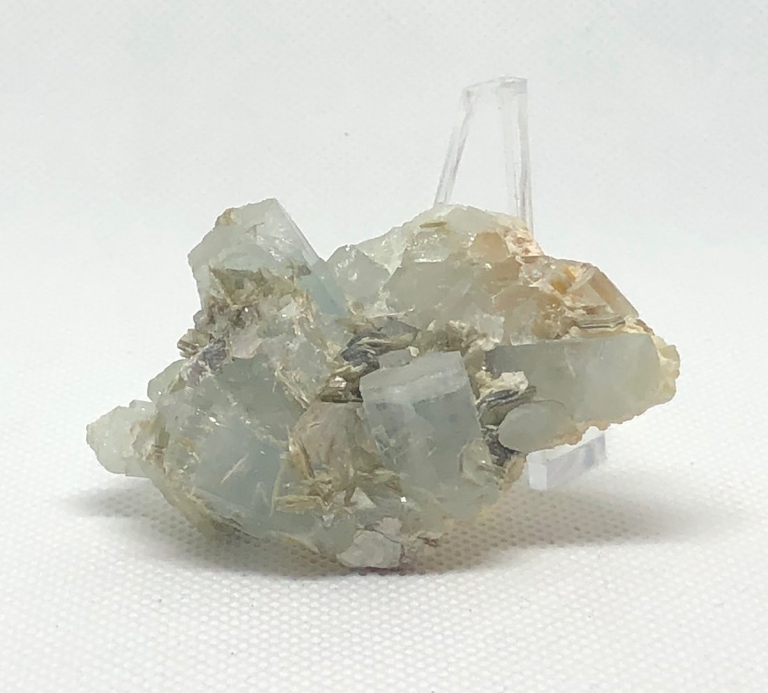 Aquamarine Specimen: Aquamarine specimen with multiple crystals in the formation. Approx 2.5" x 1.5" x .75". Weight is 50 grams. Gilgit, Pakistan. AS ALWAYS WE OFFER IN-HOUSE SHIPPING VIA USPS FLAT RATE SHIPPING, NO EXTRA