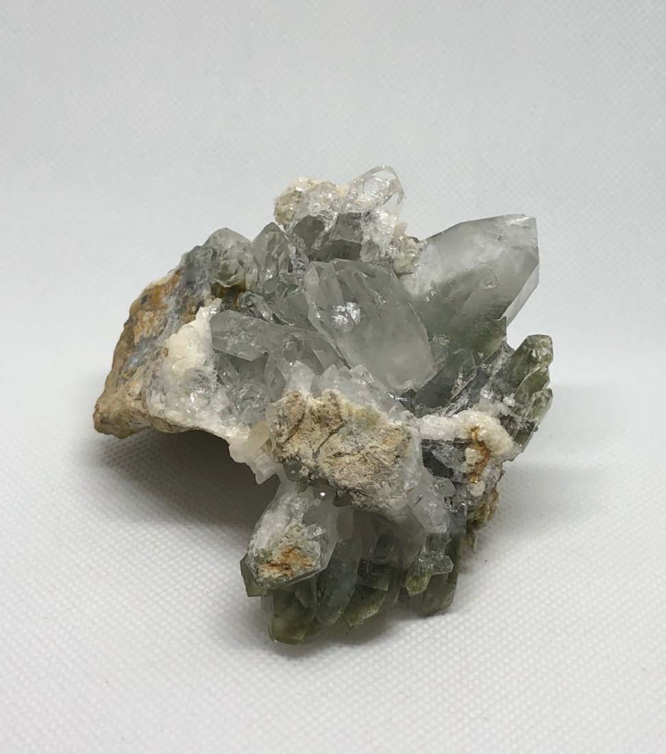 Chlorite Quartz Cluster: Beautiful chlorite quartz specimen. Multiple very nice points. Pakistan. Approx 3.5" x 3.5" x 2". AS ALWAYS WE OFFER IN-HOUSE SHIPPING VIA USPS FLAT RATE SHIPPING, NO EXTRAVAGANT SHIPPING FEES!