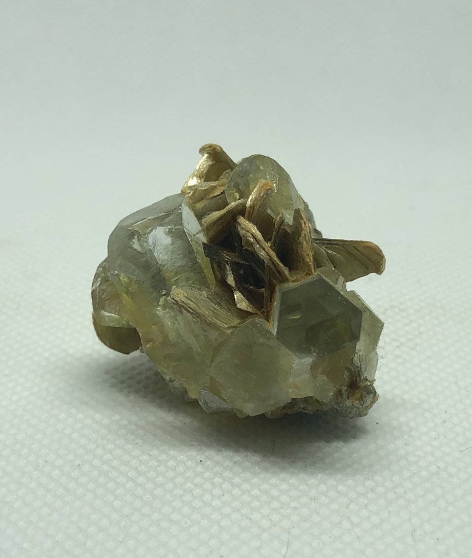 Aquamarine Specimen: Numerous gemmy crystals on matrix with mica. Gilgit, Pakistan. Approx 1.75" x 1". AS ALWAYS WE OFFER IN-HOUSE SHIPPING VIA USPS FLAT RATE SHIPPING, NO EXTRAVAGANT SHIPPING FEES!