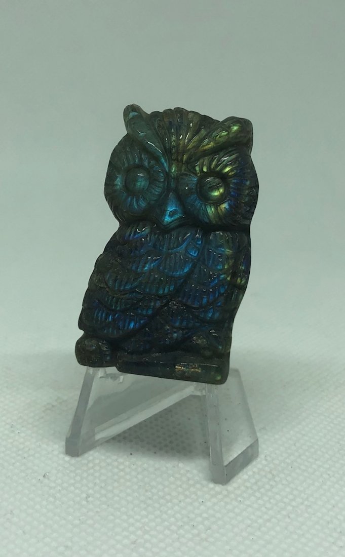Labradorite Owl: Very pretty labradorite owl carving. Approx 1.75" x 1". AS ALWAYS WE OFFER IN-HOUSE SHIPPING VIA USPS FLAT RATE SHIPPING, NO EXTRAVAGANT SHIPPING FEES!