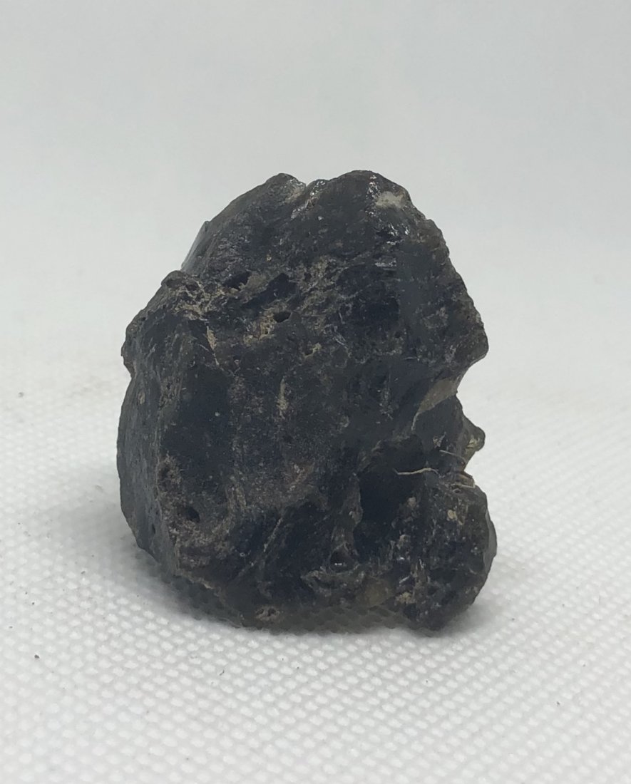 Darwin Glass Tektite: Darwin glass is a form of impactite/tektite from the Darwin Crater near Mount Darwin. West Coast, Tasmania. 19 Grams. AS ALWAYS WE OFFER IN-HOUSE SHIPPING VIA USPS FLAT RATE SHIPPING, NO EXTRAVAGANT S