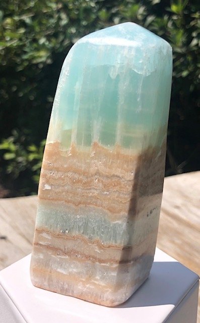 Caribbean Calcite Freeform: Very nice caribbean calcite freeform. Beautiful piece with very nice color. Small natural chip on one corner. Approximately 4.5".