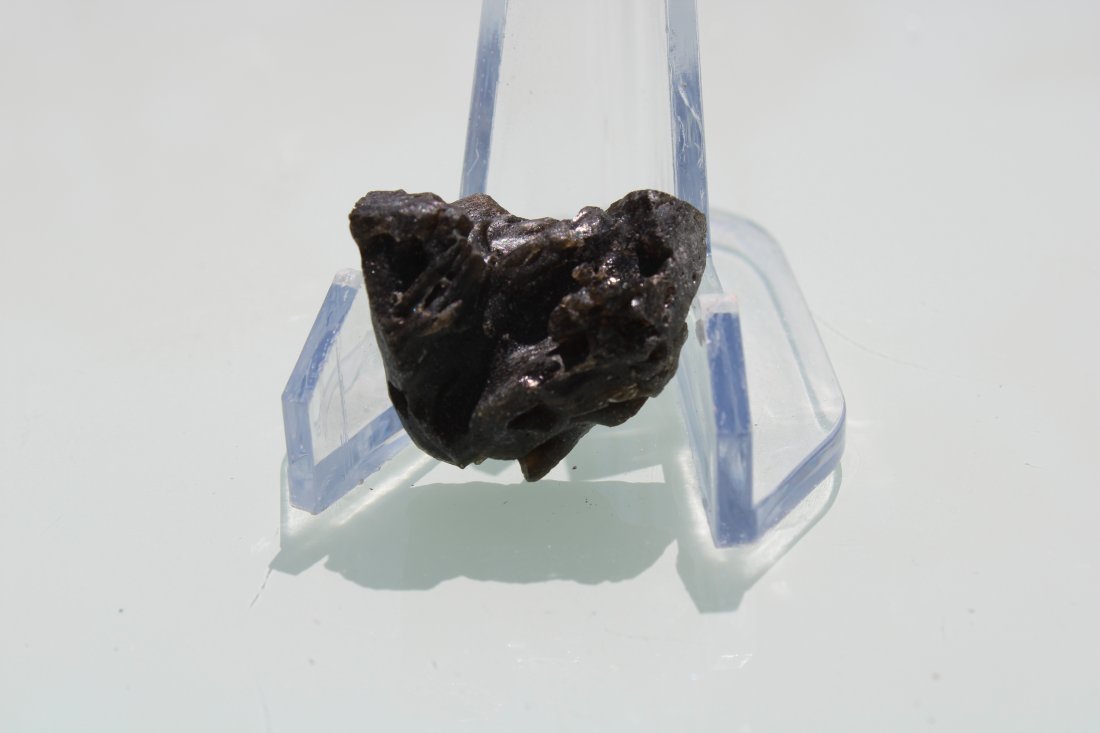 Darwin Glass Tektite: Darwin glass tektite from the Darwin Crater. Australia. Approximately 30mm x 25mm.