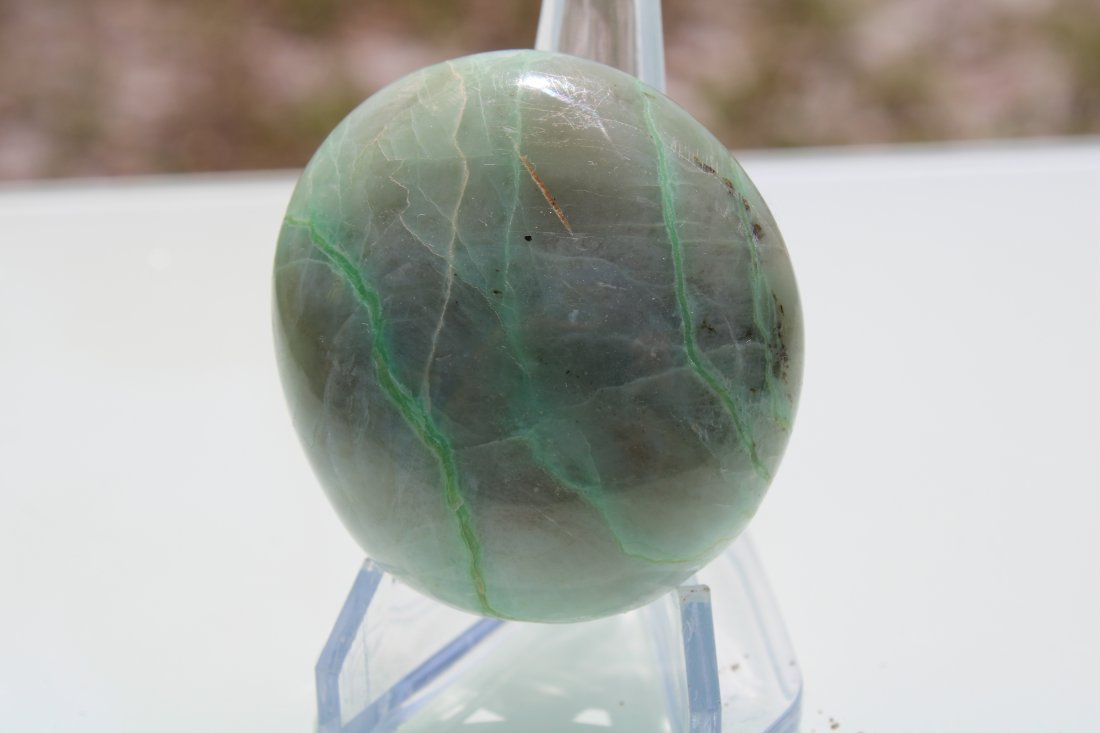 Green Moonstone Palm Stone: Fantastic green moonstone palm stone. Dark green veins have amazing color. Approximately 50mm x 55mm.