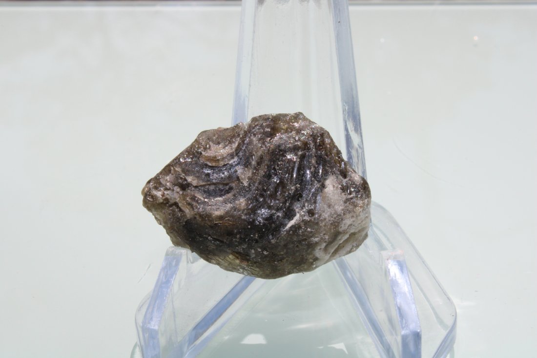 Darwin Glass Tektite: Darwin glass tektite from the Darwin Crater. Australia. Approximately 35mm x 25mm.