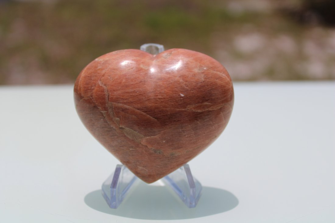 Peach Moonstone Heart: Nice sized peach moonstone heart carving. Approximately 75mm x 60mm.