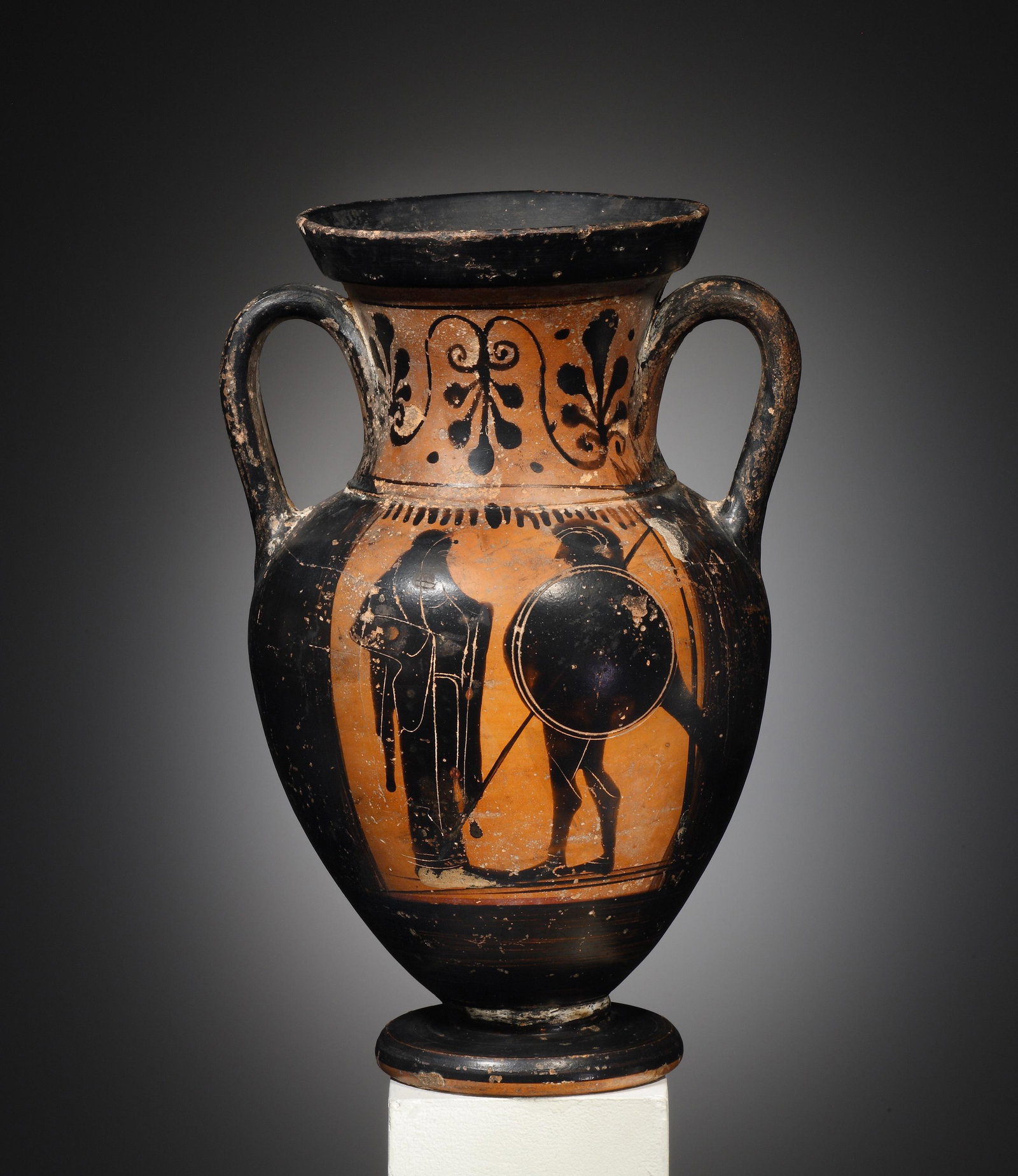 An Attic Black-Figure Amphora with Departure Scenes: Greek, Attic ca. 550 B.C. Clay. H. 25.6 cm. A small amphora with a panel of reserve on either side. A departure scene is shown on each, with an armed hoplite at the right and a veiled woman to the lef