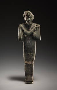 A Statuette of Osiris: Egyptian Late Period, 6th - 5th cent. B.C..Bronze. H. 20 cmHollow cast; finely worked; crown and base are missing. Remains of an old collection mount from the early 20th century. Broken at the