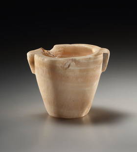 An Alabaster Jar with Handles: Egyptian 3rd - 1st mill. B.C..Stone (Alabaster). H. 6.2 cmThick-walled body of conical shape and with lateral handles. Chip at the rim.Formerly priv. coll. M.C. (b. 1933) and R. C-B. (b. 1929),