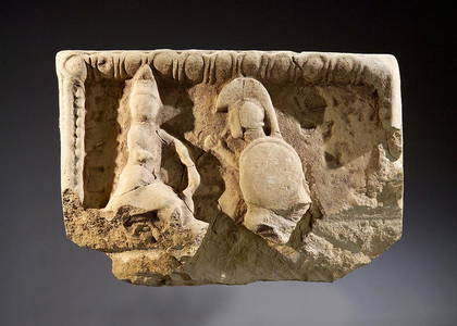 Fragment of a metope with fighting warriors