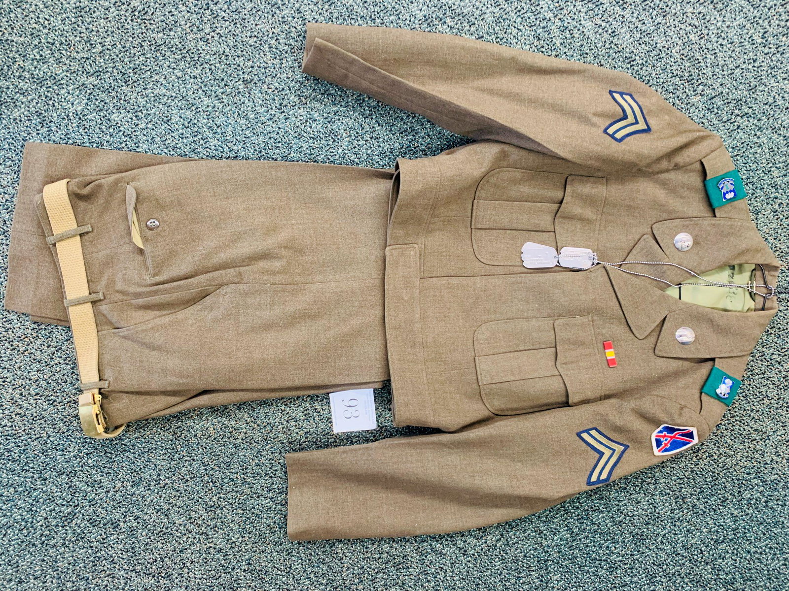 Complete 10th mountain division IKE Jacket with all: Complete 10th mountain division IKE Jacket with all insignia including Dog Tags, pants most likely Korean War 1950s