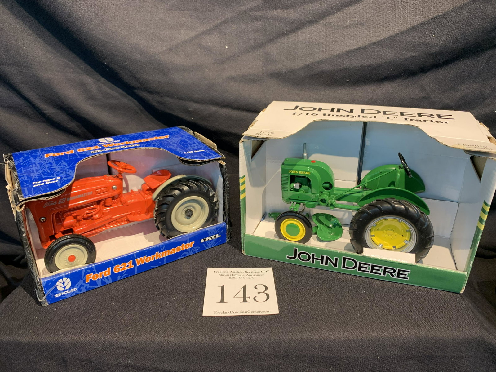 pair of John Deere and Ford scale model tractors in: pair of John Deere and Ford scale model tractors in original boxes