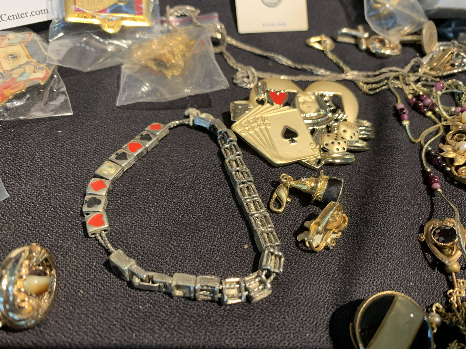 large group of vintage and antique pins bracelets: large group of vintage and antique pins bracelets Playboy key chain and others