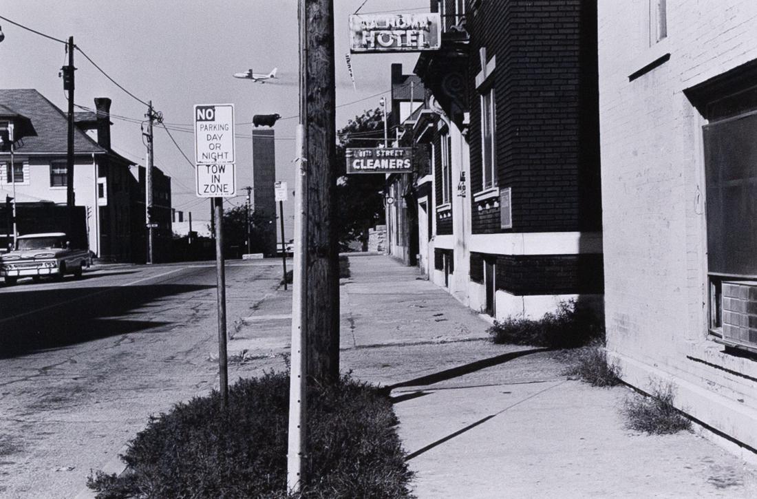 LEE FRIEDLANDER ICON KANSAS CITY Plane Bull 1965: LEE FRIEDLANDER Kansas City, Missouri (22-25) 1965 Plane over Bull 6.5x9.875" Signed Gelatin Silver Print 1973 ASG# LF/1302 signed on mount under print right, mounted on 16x20" decal edged embossed pa