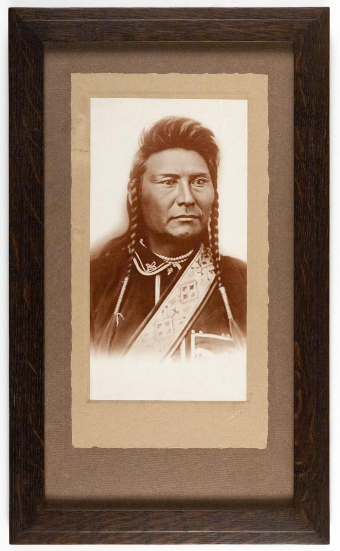 D. F. BARRY CHIEF JOSEPH NEZ PERCE 1877: DAVID F. BARRY Joseph, Nez Perce, 1877, 12x7" on 16.6x8.6" light brown paper on 21.5x11.7" dark brown heavy paper. Collodion Silver Print printed 1910s. Verso has D.F. Barry Superior Wisconsin label. 