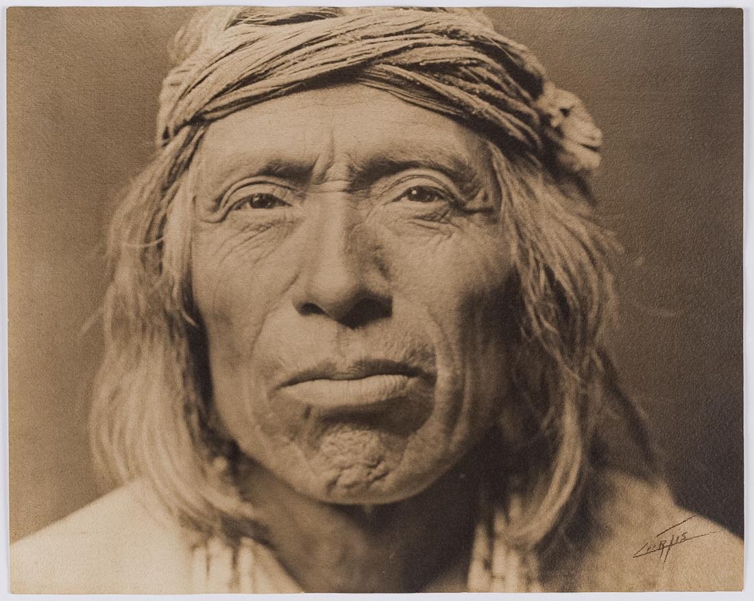 Edward Curtis Shiwawatiwa Zuni 1903 Modernist Portrait: EDWARD SHERIFF CURTIS Shiwawatiwa - Zuni, 1903, 12.6X15.7" Platinum Print ca.1904. Signed lower right.ASG# ESC/7557 FRAMED This image combines the power of pictorialist character lighting with the com