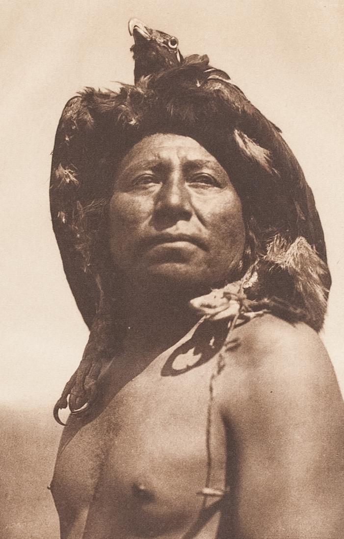 EDWARD CURTIS The Eagle Medicine-Man Apsaroke 1908: EDWARD CURTIS The Eagle Medicine-Man Apsaroke [Crow] 1908 7.5x4.75" photogravure on 12.5x9.5" Holland Van Gelder Paper from Volume IV (Apsaroke, Crow, Montana) of The North American Indian ASG# ESC/87