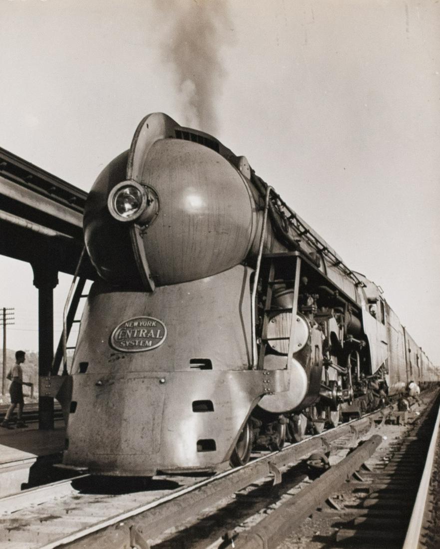 ALFRED EISENSTAEDT The 20th Century: ALFRED EISENSTAEDT, 20th Century Limited locomotive on tracks, c. 1941, 9.625x7.875" Gelatin silver print, Printed c. 1941, Inscribed in pencil on print verso: at Harmon - stay five min - other stops