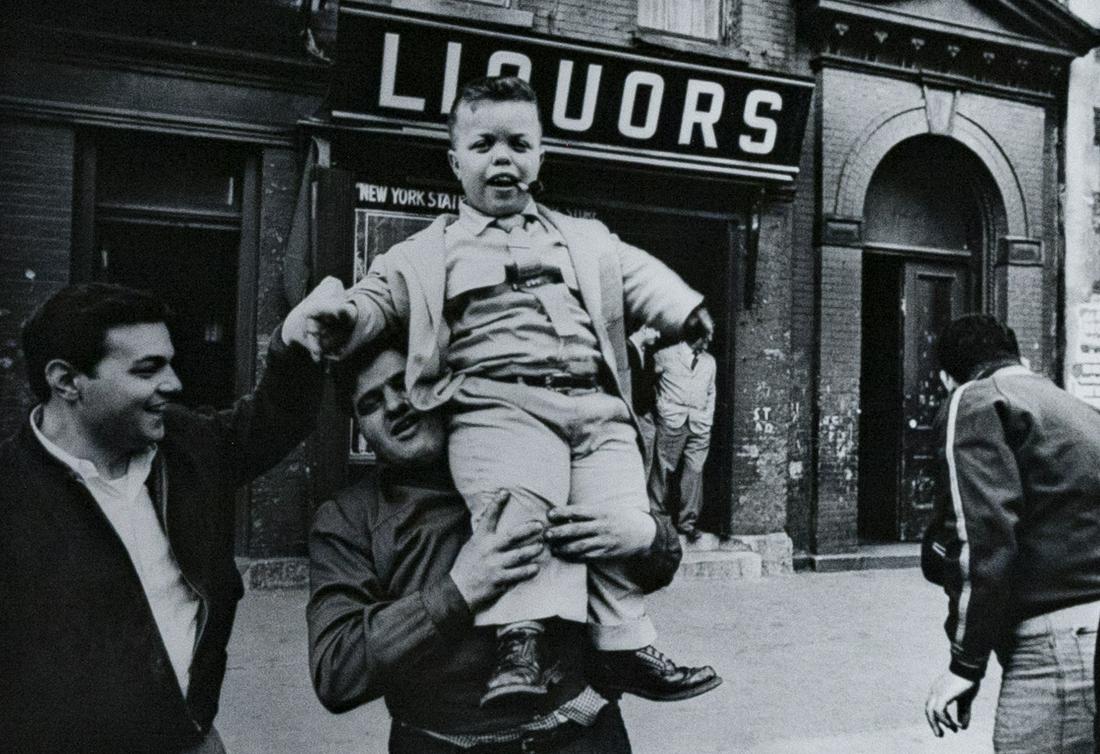 WILLIAM KLEIN Dwarf NY 1954: WILLIAM KLEIN, Dwarf + Liquors, New York, 1954, 9.625x14.125" Gelatin silver print, Printed Printed later, Signed and inscribed in pencil on print verso: New York 1954 / William Klein. Photographer's