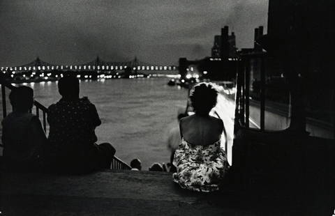 ALFRED WERTHEIMER Waterfront Evening 1970s: ALFRED WERTHEIMER, Watching the Waterfront, Woman on stairs facing waterfront, 1970s c, 8.5x13" Gelatin silver print, Printed later, Inscribed in pencil on print verso: Photo by / Alfred Wertheimer 