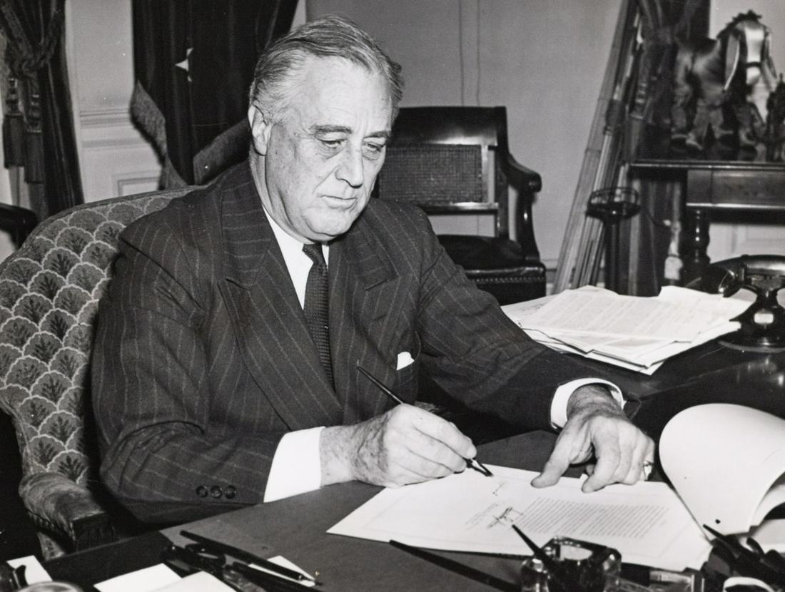 SY SEIDMAN FDR Repeals Prohibition: SY SEIDMAN, President Roosevelt signing Repeal of Prohibition bill, 1933, 6.625x8.625" gelatin silver print, printed c. 1930s. Inscribed in black pencil on print verso: Pres. Roosevelt / signing repea