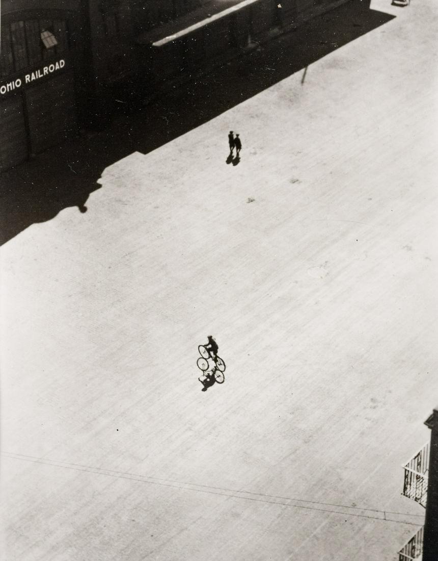 RALPH STEINER Bicycle with Shadow 1980: RALPH STEINER, Bicycle with Shadow, 1921-1922, 4.75x3.7", gelatin silver print, printed 1980. Inscribed on print verso: Ralph Steiner 1921-1922/1980 / PAA 7,8. Steiner was best know for his small, gem