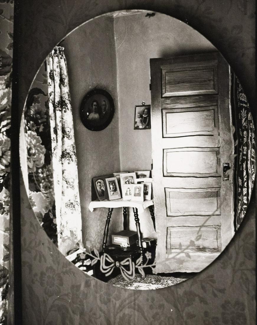 WRIGHT MORRIS The Home Place 1947: WRIGHT MORRIS, Reflection in Oval Mirror, The Home Place, 1947, 9.5x7.5" gelatin silver print, printed c. 1980s. Signed in pencil on print verso; inscribed in pencil: PAA 37,4 / 3 (circled). The Home 