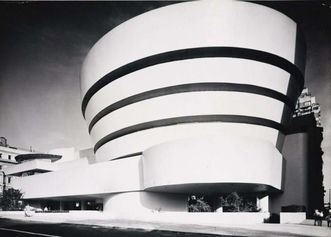 4 FRANK LLOYD WRIGHT portraits and buildings: 1. EZRA STOLLER ASSOC., Exterior of the Solomon Guggenheim Museum, as viewed across Fifth Avenue from 88th Street, NYC, c. 1960s, 6.75x9.5", gelatin silver print, printed c. 1960s. Blind stamped in lo