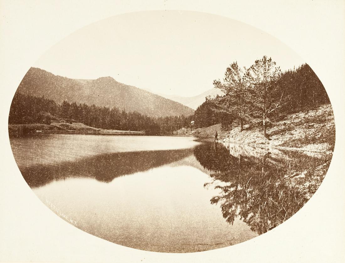 WILLIAM HENRY JACKSON Fishing on Mystic Lake Montana: WILLIAM HENRY JACKSON, 035 Mystic Lake, M.T. , 1872, 9x12.25" oval albumen print, Printed c. 1872, printed Hayden Survey and William Henry Jackson photo credit, Three Tetons in negative lower left, in