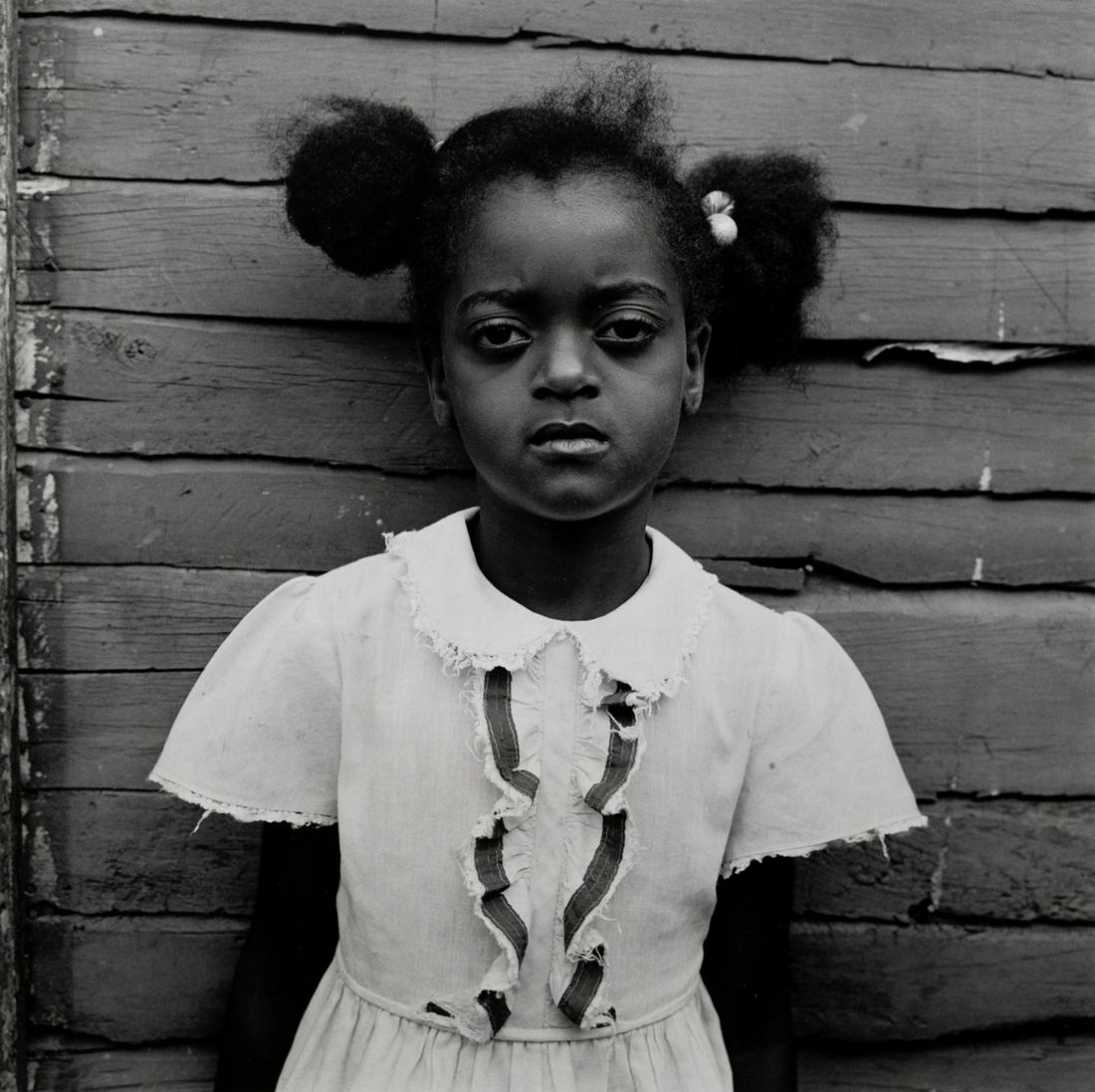 GORDON SMITH Wonderful Portrait 1990: GORDON SMITH. Meggie's Cousin, Jamaica, c. 1990. 13.5x 3.5" gelatin silver print. Printed c. 1995. Signed in pencil on print verso. Gordon R. Smith is an American photojournalist whose photographs are